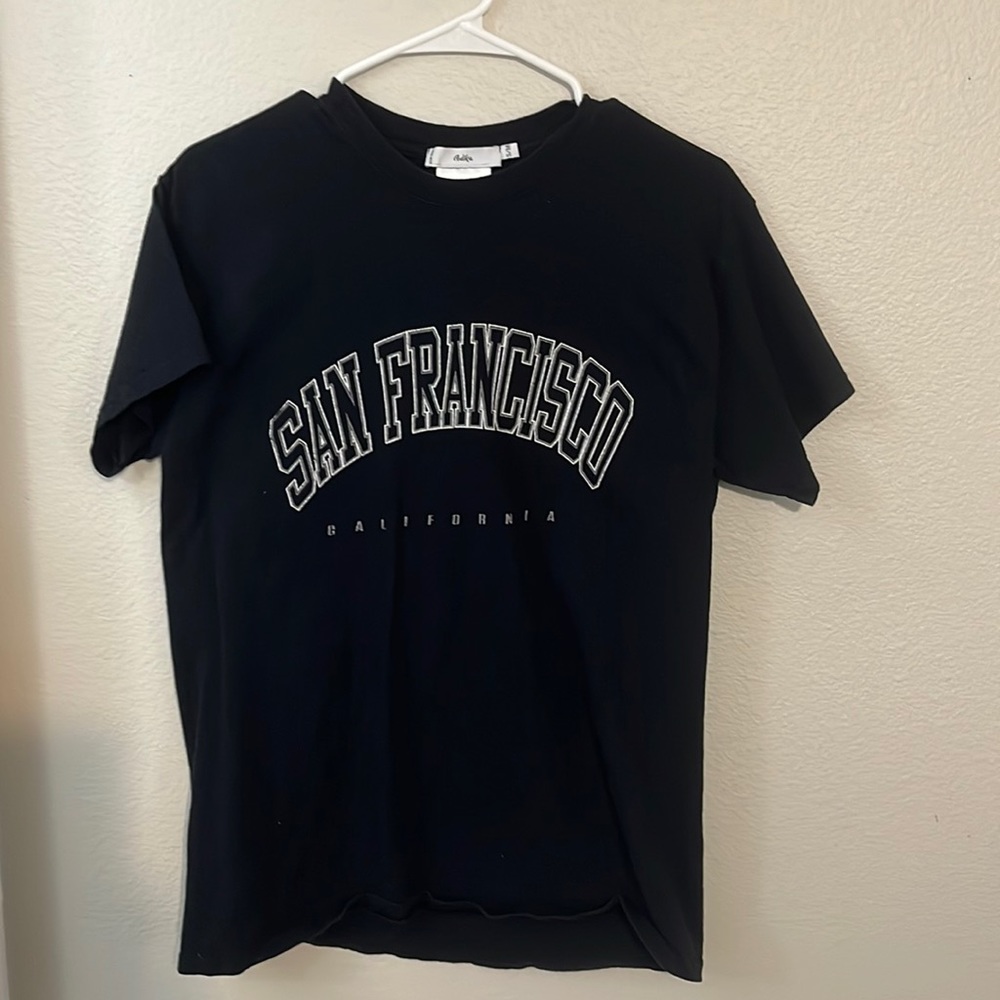adika never worn graphic tee